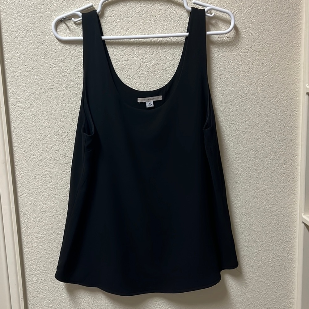 Woman’s black tank top